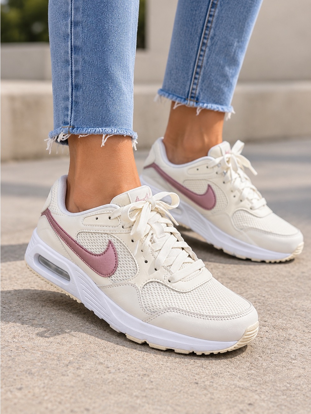 Nike Women’s White Mesh Sneakers with Rose Gold Swoosh Accent